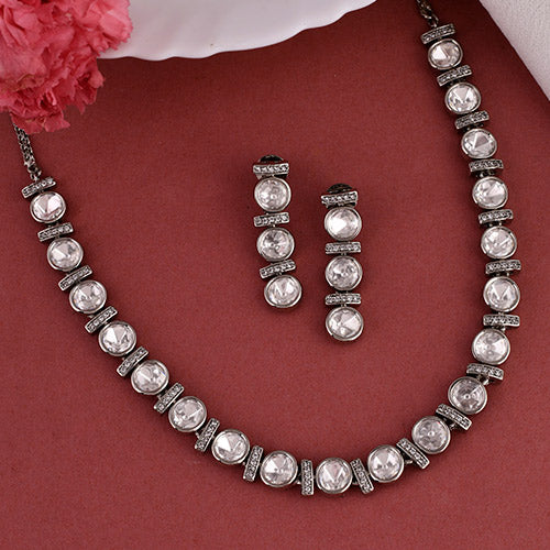 Intrinsically hand crafted White Gold Plated Polki Kundan Brass Necklace and matching Earrings set with American diamonds Online jewellery shopping