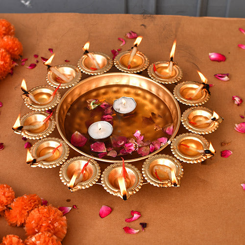 Lali’s Beautiful Golden 13 Deepaks attached Urli bowl Decorative Showpiece – (Metal, Golden) in Hammered finish Indian handicrafts online shopping